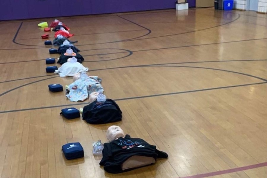 Lasalle-School-dummie-lineup 
Chicago CPR Academy Manikins set up for large on-site group training.
