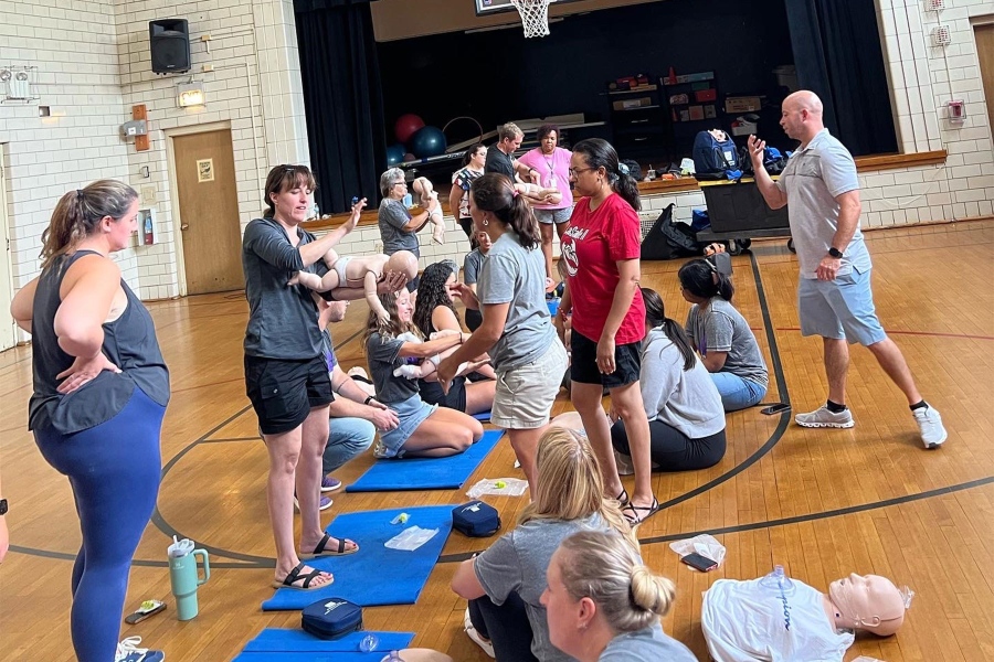 Lasalle-School-instruction 
Chicago CPR Academy instructor, Kevin, explaining how to perform back blows and abdominal thrusts on a choking infant.